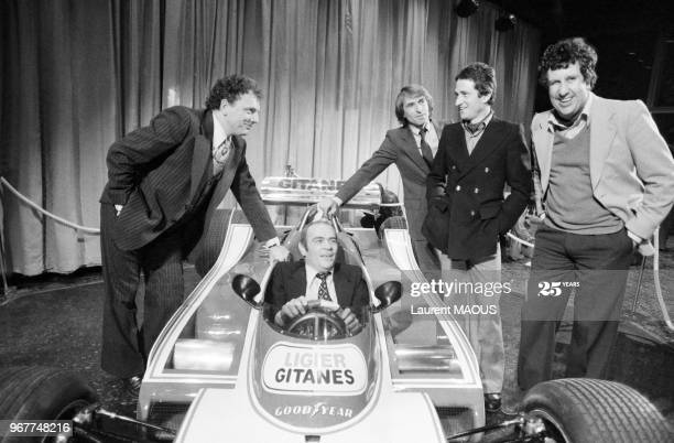 Guy Ligier presents his car, the Ligier Gitanes, with Jacques Martin, Jacques Laffite, Patrick Depailler and Stéphane Collaro on November 23, 1978 in Paris, France. 