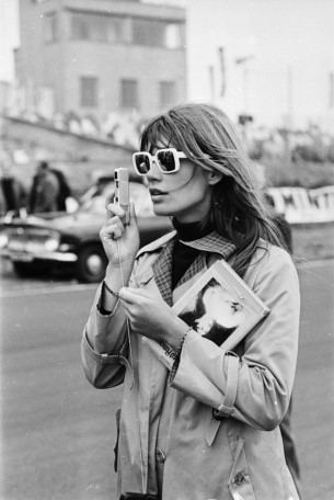 Francoise Hardy, sunglasses and camera.