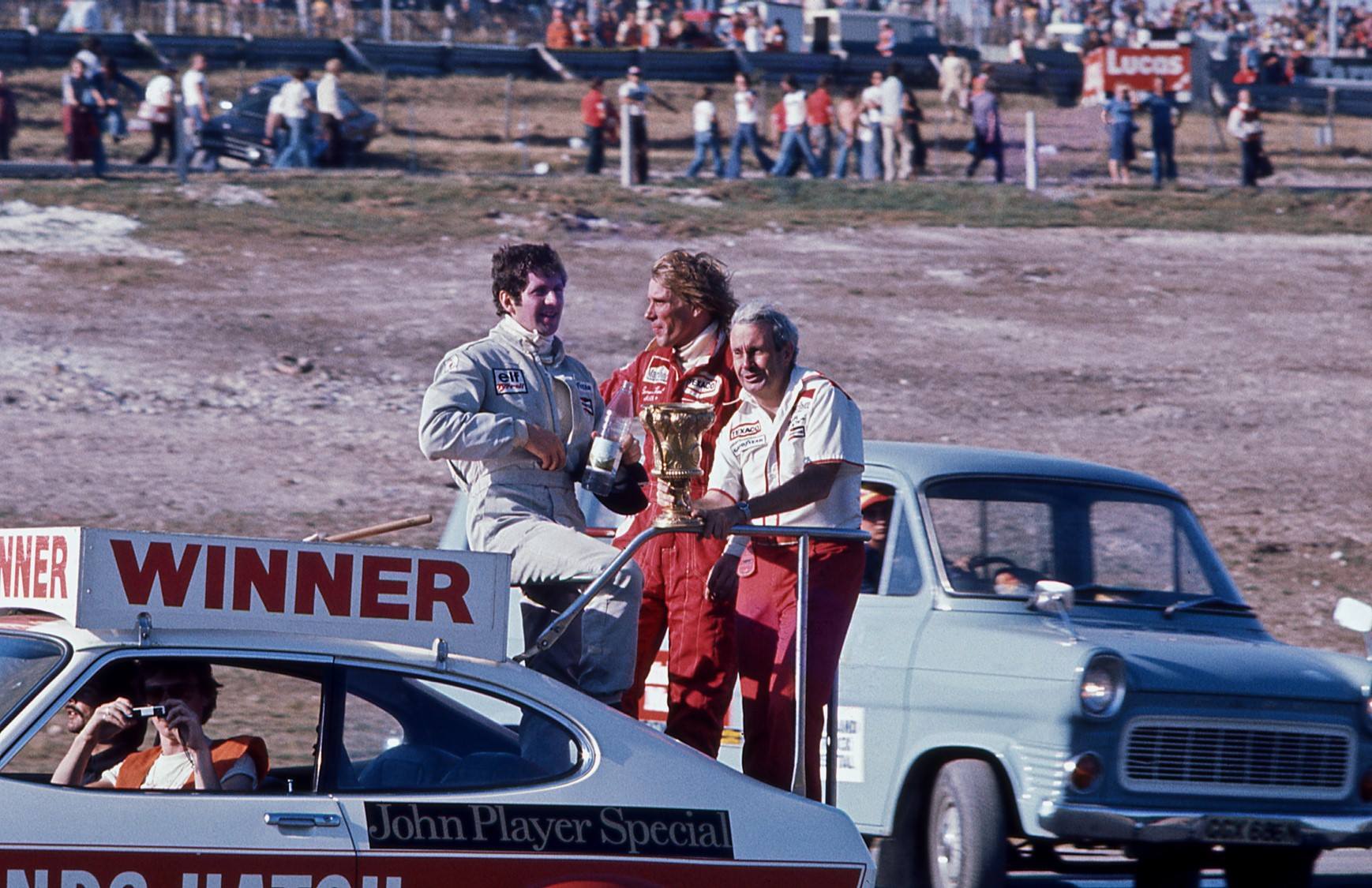 Jody Scheckter, James Hunt and Teddy Mayer.