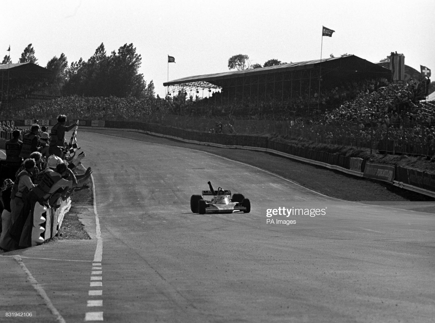 James Hunt crosses the finishing line in his McLaren to win the 1976 British Grand Prix. 
