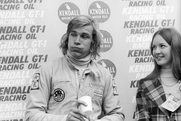 Second placed James Hunt, Hesketh, enjoys a cup of milk on the podium at the US GP in Watkins Glen on 07 October 1973.