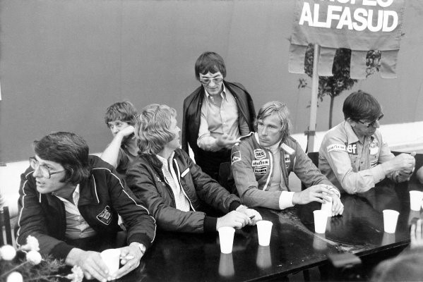 1977 Austrian Grand Prix at Osterreichring, Austria, 14 August 1977. Left-to-right: Peter Warr (Lotus team manager), Ian Scheckter (partly hidden), Max Mosley, Bernie Ecclestone, James Hunt and Ken Tyrrell. 