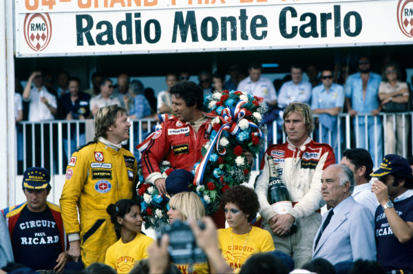Ronnie Peterson, Mario Andretti and James Hunt on the podium at the French Grand Prix in Paul Ricard, Le Castellet, on 02 July 1978. 
