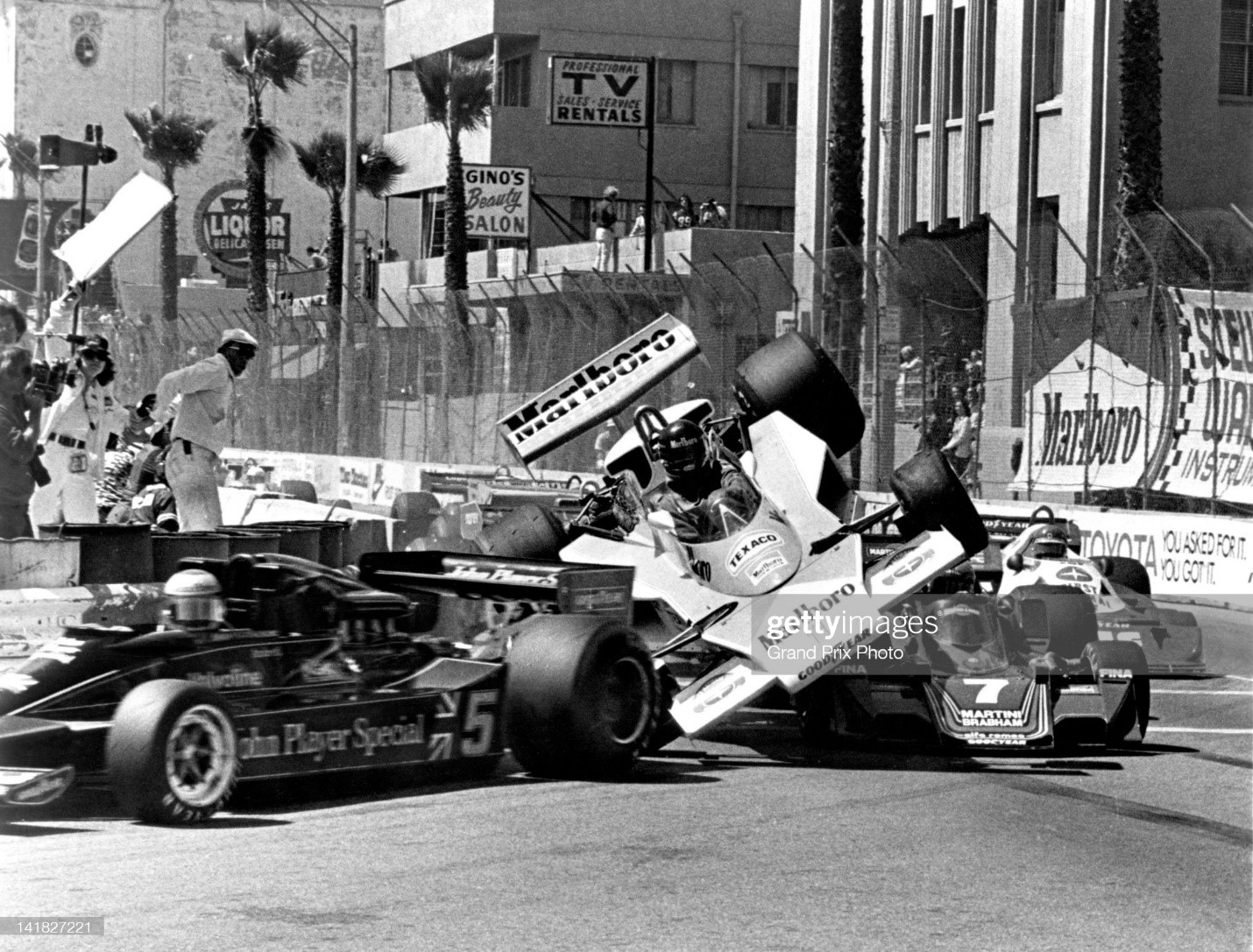 James Hunt, driver of the n.1 Marlboro Team McLaren M23 Ford V8, is launched into the air after hitting the rear wheel on the Martini Racing Brabham BT45 Alfa Romeo flat-12 of John Watson during the United States Grand Prix West on 03rd April 1977 at the Long Beach street circuit in Long Beach, California, United States. 