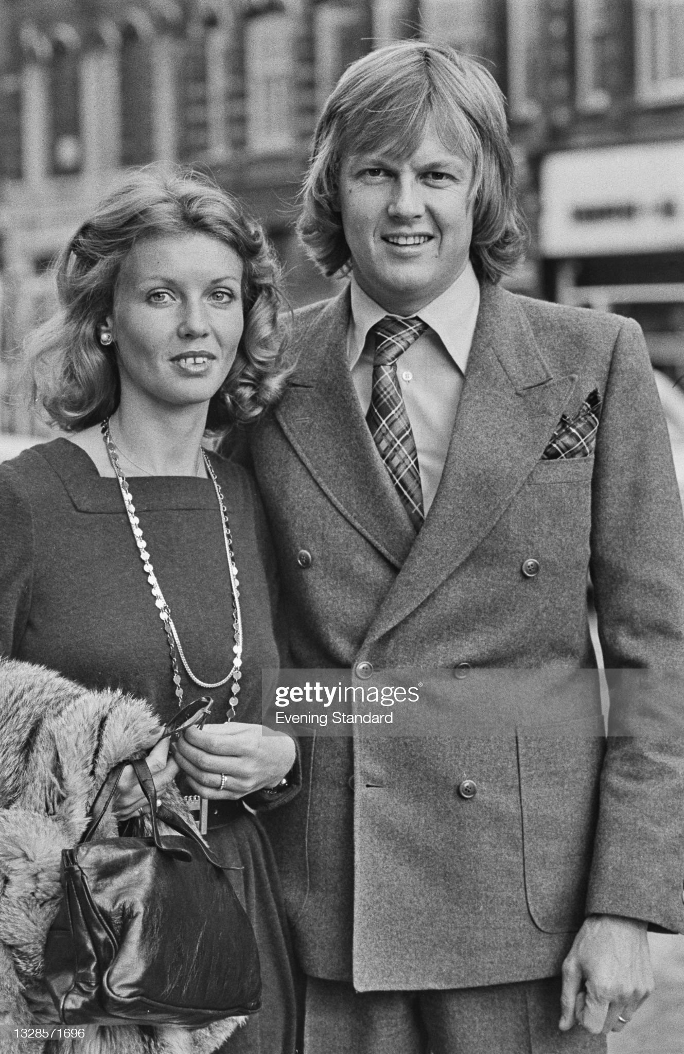 Swedish racing driver Ronnie Peterson and his girlfriend Barbro attend the wedding of British racing driver James Hunt and model Suzy Miller at Brompton Oratory in London, UK, 18th October 1974. 