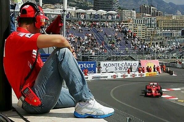 Michael Schumacher, Ferrari, watches Kimi Raikkonen, Ferrari F2008, at the Monaco Grand Prix.