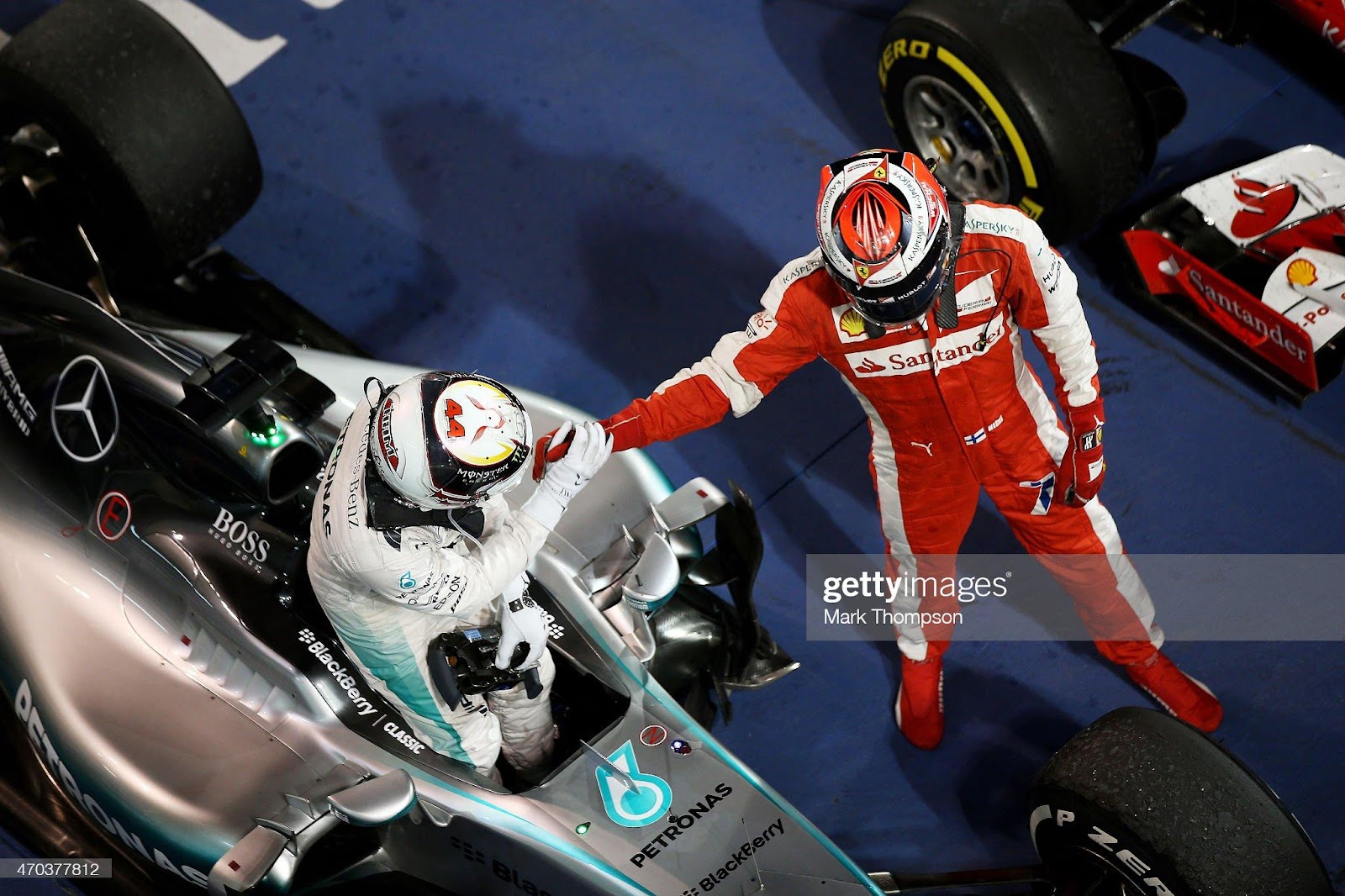 Race winner Lewis Hamilton is congratulated by Kimi Raikkonen in Parc Ferme, following the Bahrain F1 Grand Prix at Bahrain International Circuit on April 19, 2015.