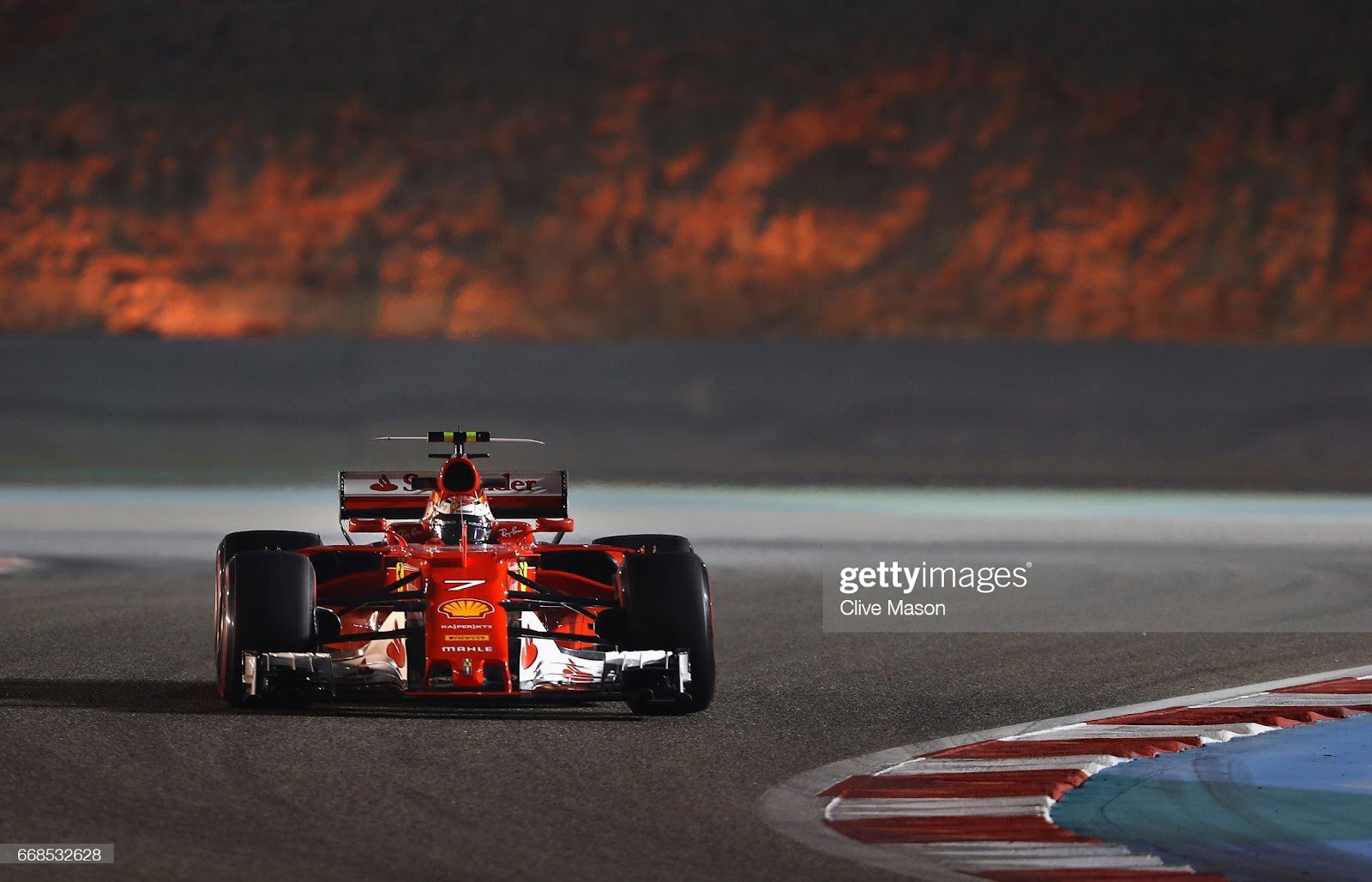 Kimi Raikkonen driving the (7) Scuderia Ferrari SF70H on track during practice for the Bahrain F1 Grand Prix at Bahrain International Circuit on April 14, 2017.