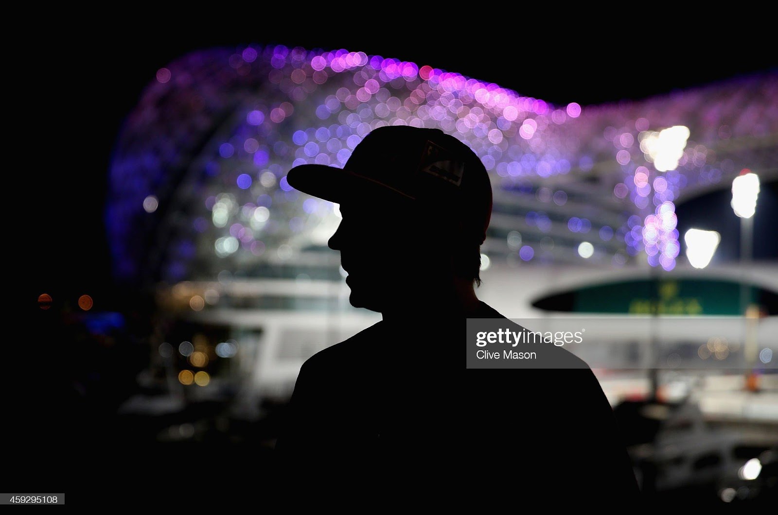 Kimi Raikkonen speaks with guests during a Shell guest appearance in Ferrari hospitality during previews ahead of the Abu Dhabi F1 Grand Prix at Yas Marina Circuit on November 20, 2014 in Abu Dhabi, United Arab Emirates. 