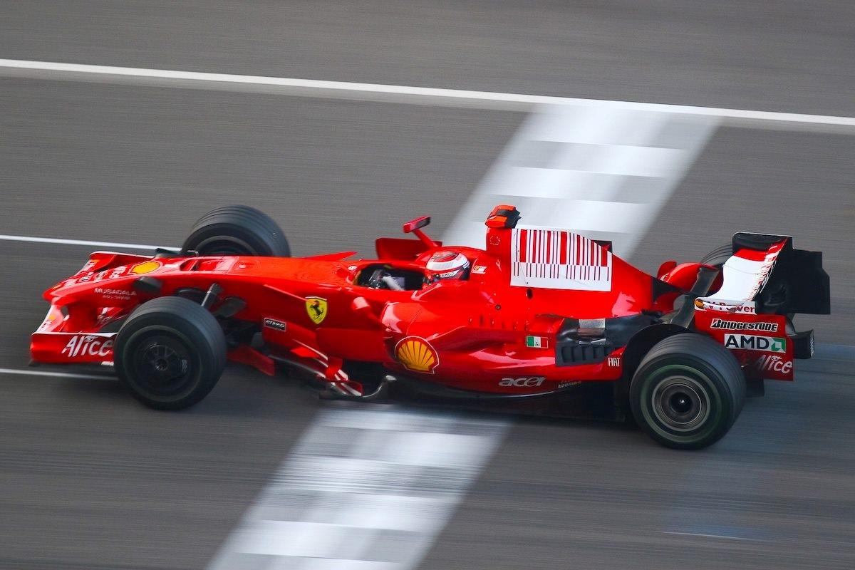 Kimi Raikkonen driving a Ferrari.