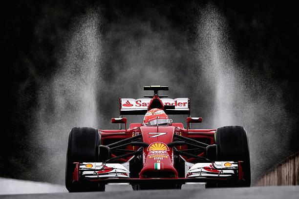 Kimi Raikkonen driving a Ferrari.