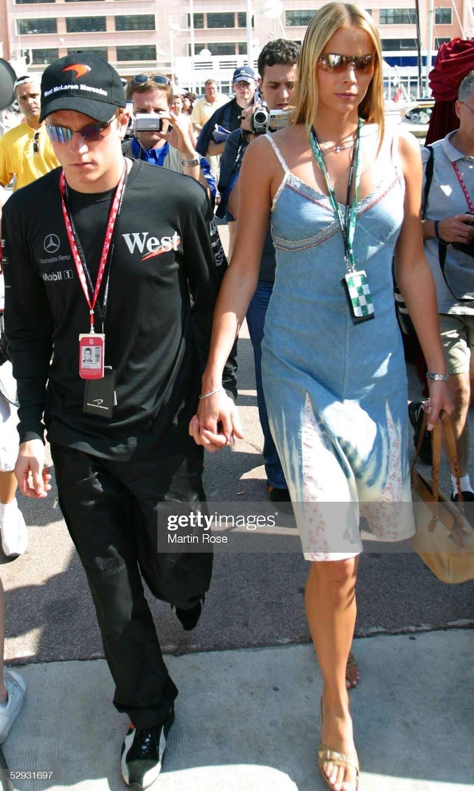 Kimi Raikkonen, McLaren Mercedes, with his girlfriend Jenni Dahlmann at the 2003 Monaco Grand Prix in Monte Carlo.