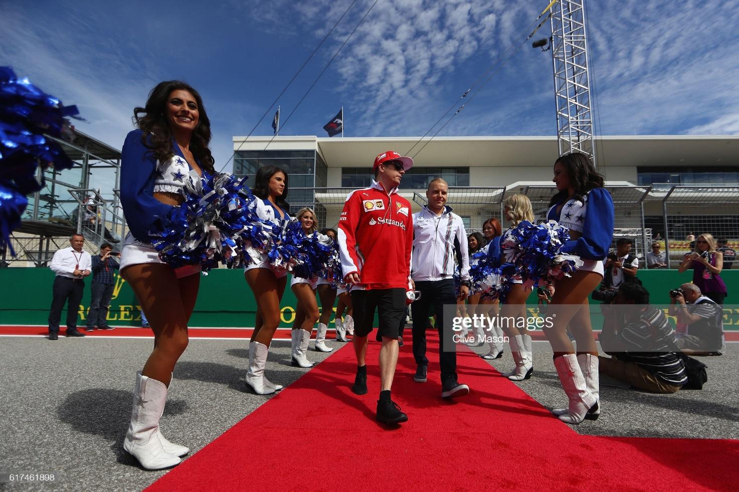 Kimi Raikkonen, Ferrari and Valtteri Bottas, Williams, walk to the drivers parade before the United States Formula One Grand Prix at Circuit of The Americas on October 23, 2016 in Austin, United States.