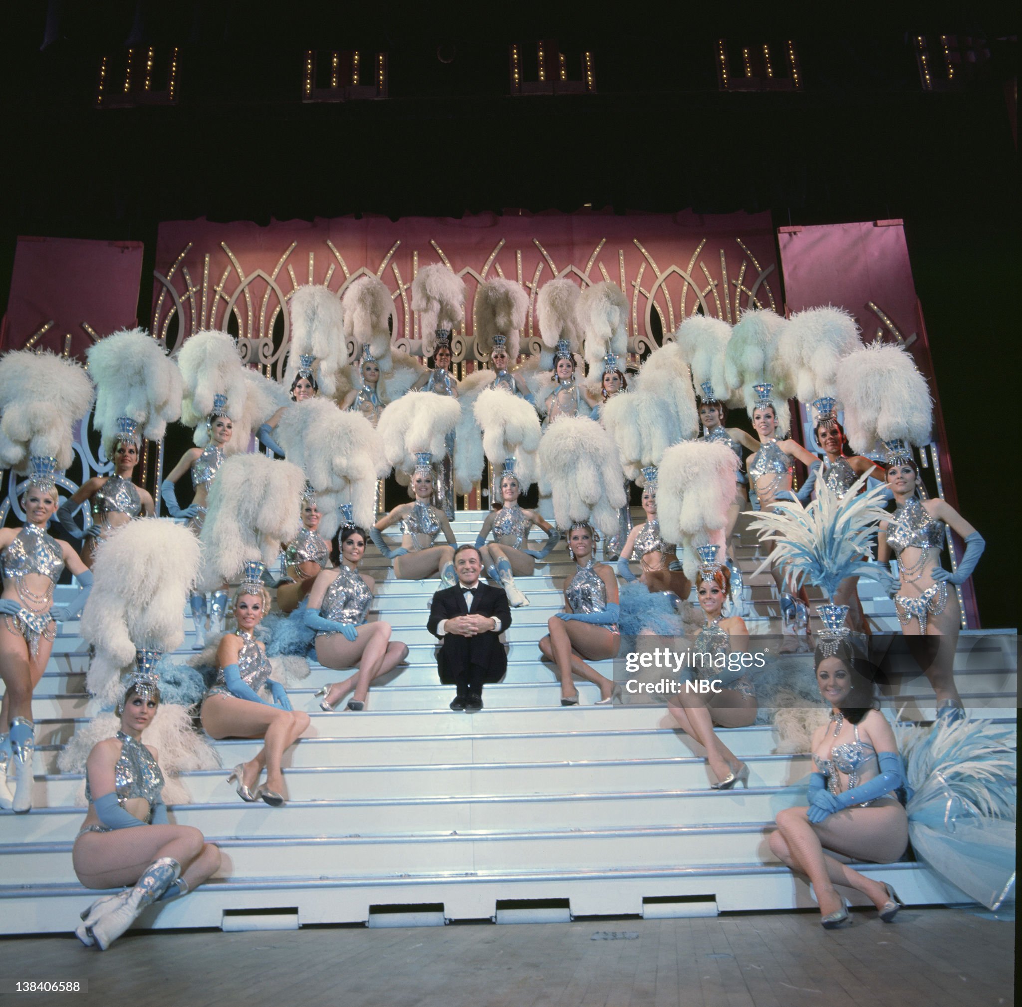 Gene Kelly’s wonderful world of girls, aired on 14 January 1970. Pictured: Gene Kelly, center, with the Folies Bergere Showgirls. 