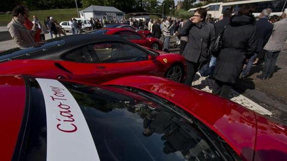 Some red Ferraris at the funeral of Little Tony.