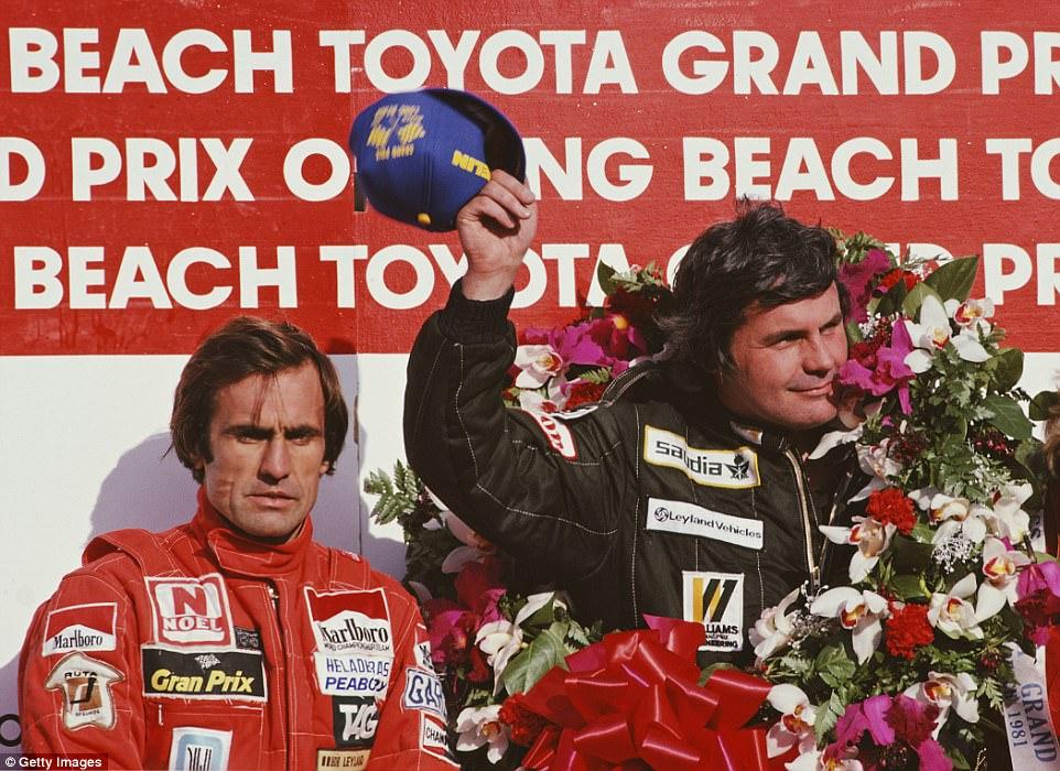 Jones celebrates victory on the podium but Reutemann cuts a frustrated figure. At the next race in Brazil, Reutemann again led but this time refused to give way to Jones before taking a controversial win.