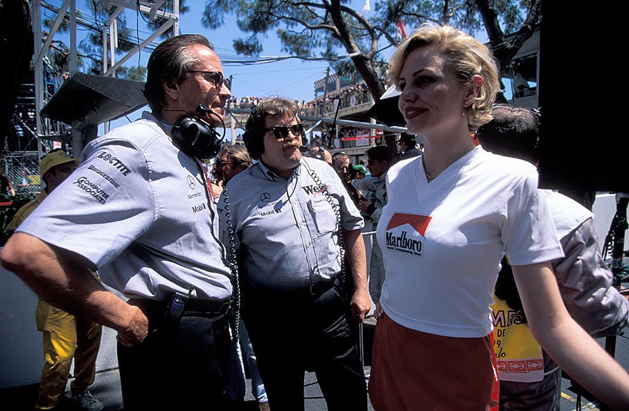 Mansour Ojjeh, Norbert Haug and a grid girl in Monte Carlo in 1999. 