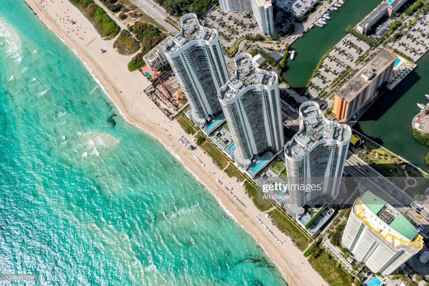 Aerial view of a South Florida beach resort shot from directly overhead at about 1000 feet in altitude. 