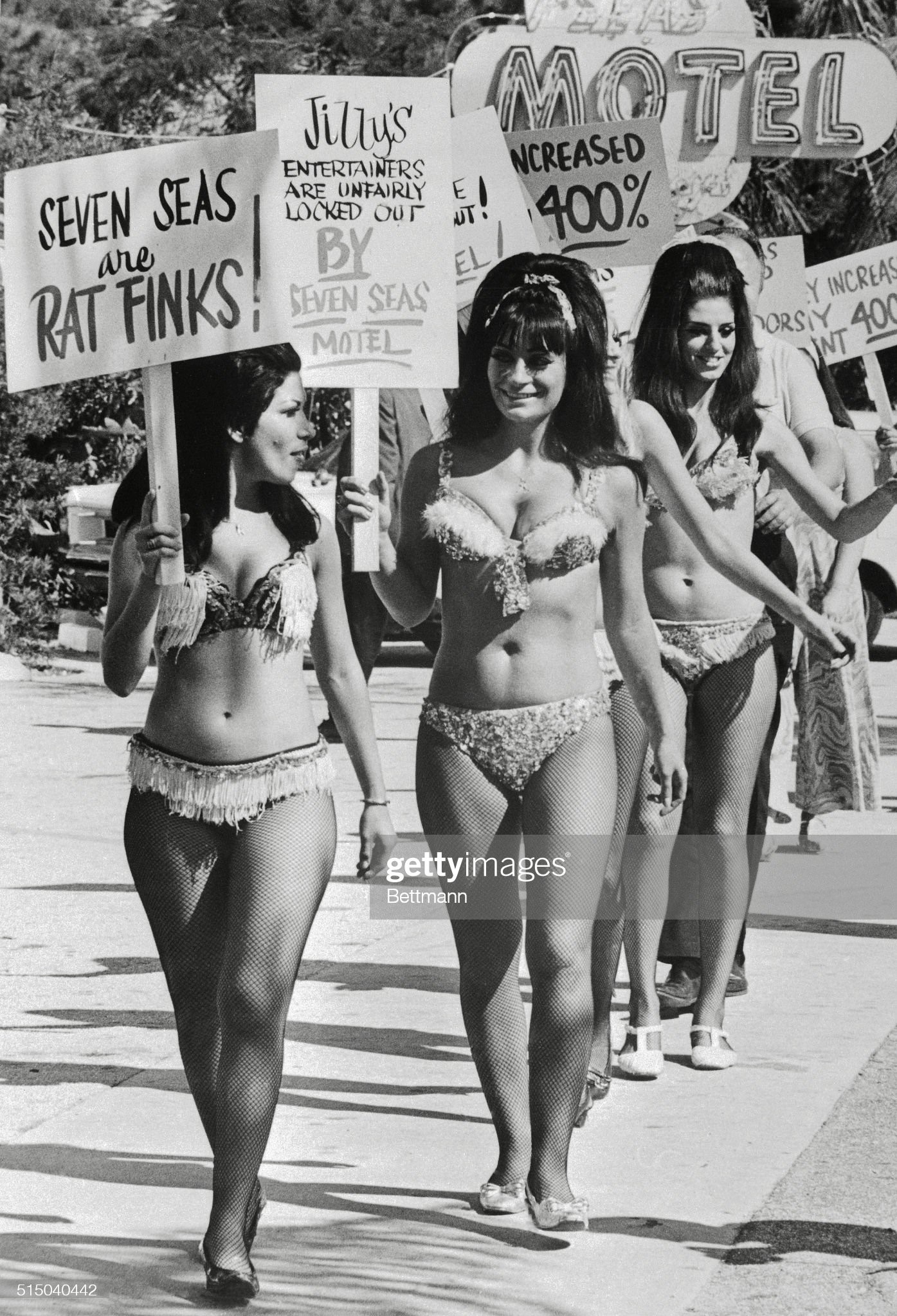 A group of Go-Go girls who claim they had a verbal agreement with the management of a motel regarding their residency there through the season, picketed the motel here 2/16 in protest of a rent hike, which they feel was not in the agreement. Dressed in the costumes they wear during their act at Jilly's, a Miami Beach nightclub, the girls were joined by other entertainers and a few drummers who have the same gripe. February 16, 1968. 