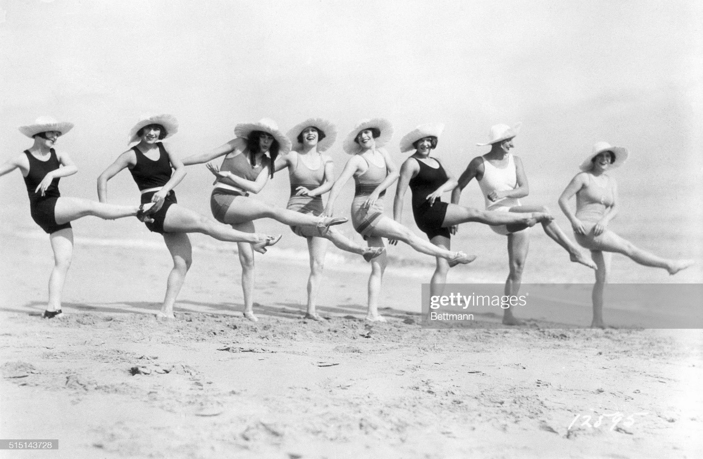 A group of women practice the Charleston on a beach in Miami on December 26, 1925. 