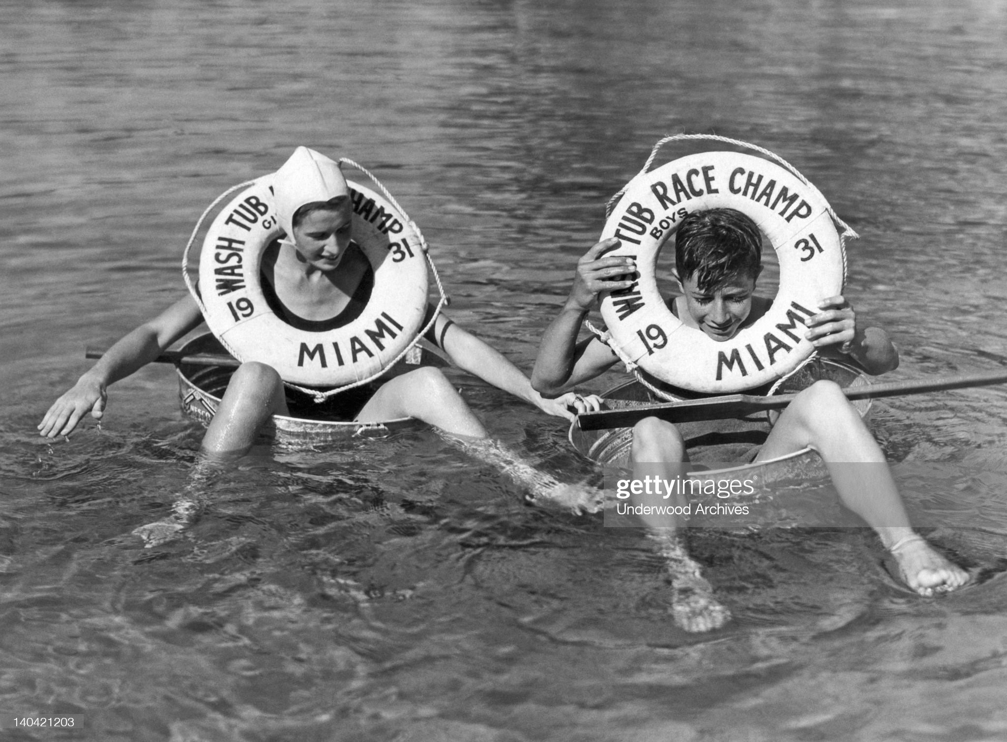 The respective boy and girl winners of the 1931 Miami, Florida Washtub Races on January 01, 1931. 