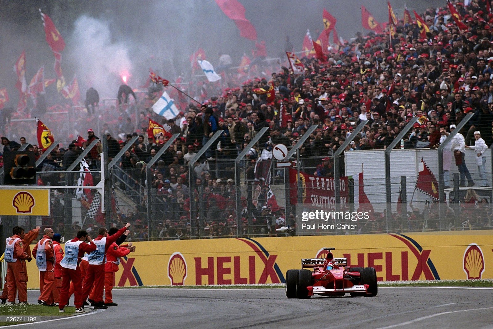 Michael Schumacher, Ferrari F1-2000, Grand Prix of San Marino, Imola, 09 April 2000. Victorious Schumacher cheered by a crowd of loving tifosi.