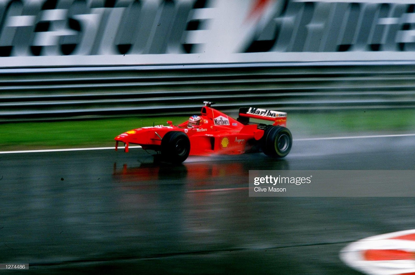 Michael Schumacher on three wheels, 30 August 1998, Spa.