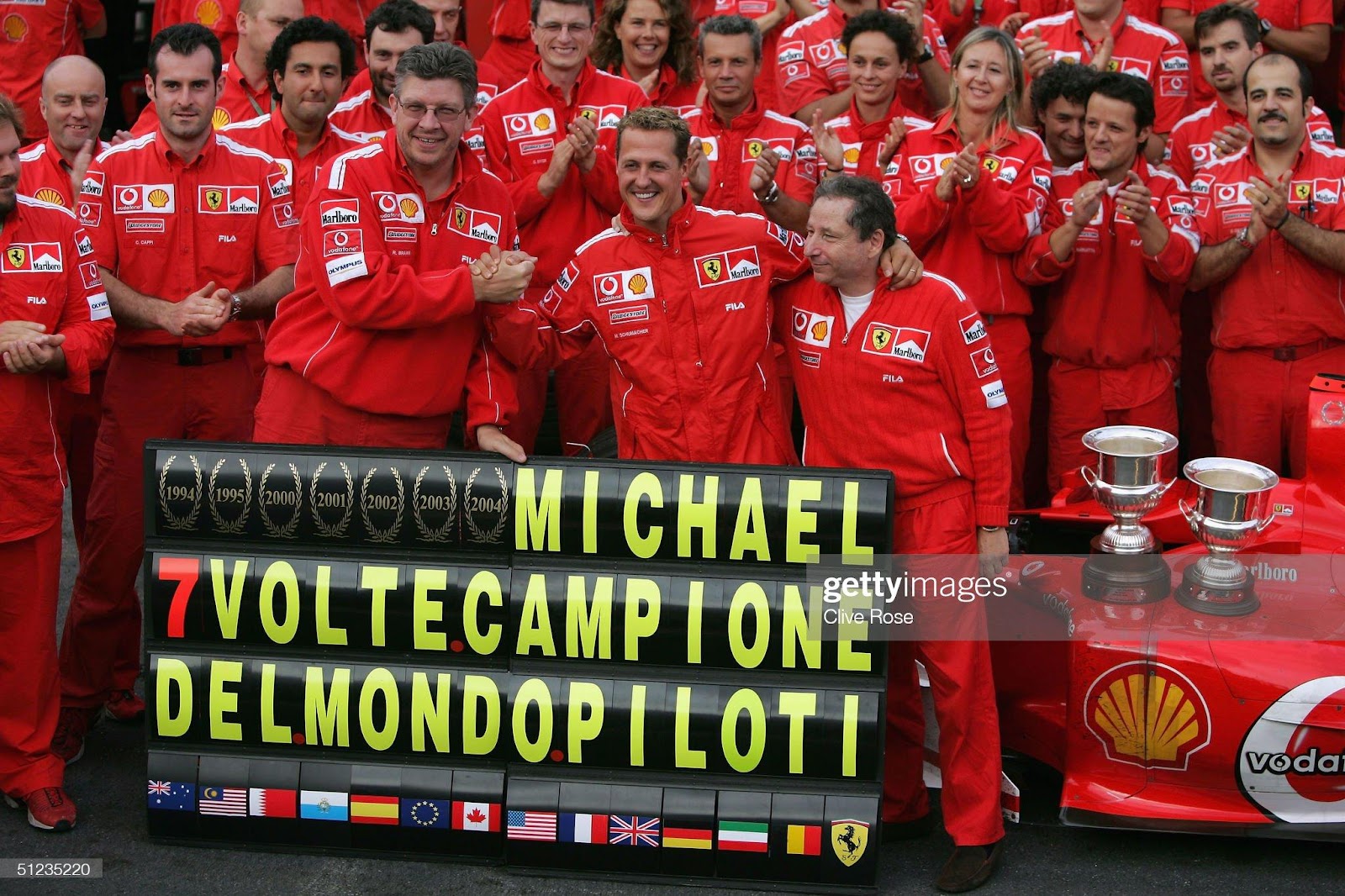 Michael Schumacher, Ferrari, celebrates winning the World Drivers Championship at the Belgium F1 Grand Prix at the Circuit of Spa-Francorchamps on August 29, 2004.