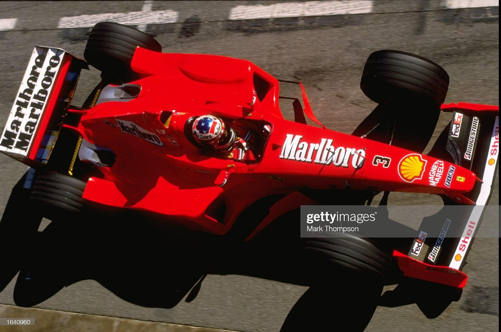 12 Feb 1999: Michael Schumacher races the new Ferrari F399 during a F1 testing session at the Circuit de Catalunya in Barcelona, Spain.