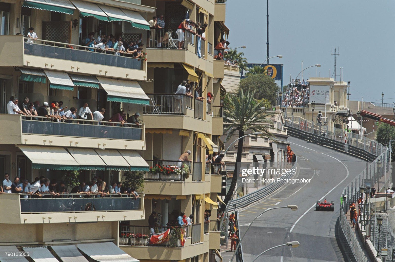 Michael Schumacher drives the n.1 Ferrari F-2001 V10 up Beau Rivage past the watching spectators on their balconies during the F1 Monaco Grand Prix on 27 May 2001.