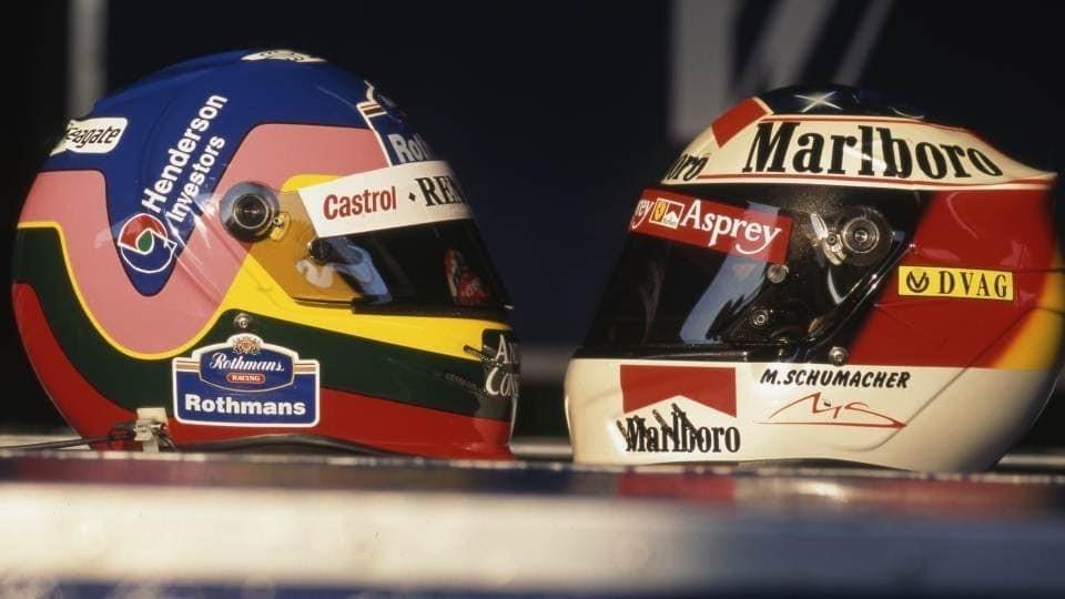 The helmets of Jacques Villeneuve and Michael Schumacher.