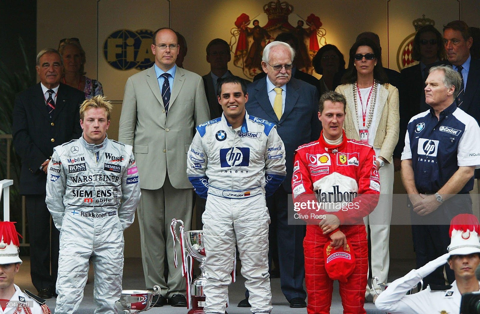 Kimi Raikkonen of Finland and McLaren, Juan Pablo Montoya of Colombia and Williams and Michael Schumacher of Germany and Ferrari after the F1 Monaco Grand Prix on June 1, 2003 in Monte Carlo, Monaco.