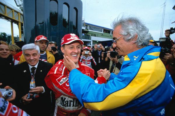 Flavio Briatore, Benetton and Michael Schumacher, Ferrari.