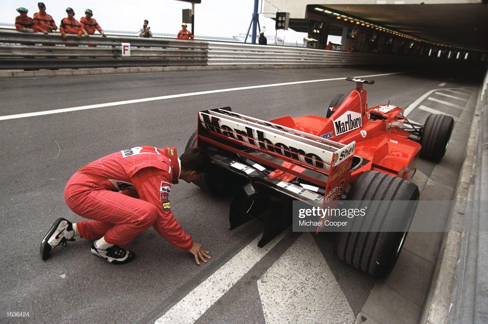 21-24 May 1998: Michael Schumacher looks at his broken down Ferrari during the Monaco Grand Prix at the Monte Carlo circuit.