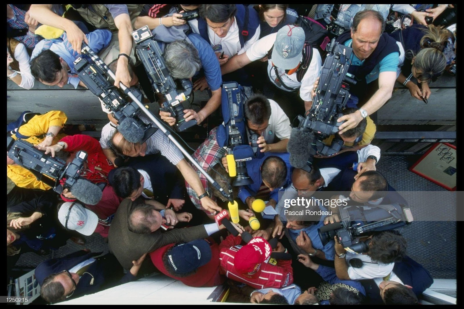 05 April 1996: the press besieges Michael Schumacher during the San Marino Grand Prix in Imola.