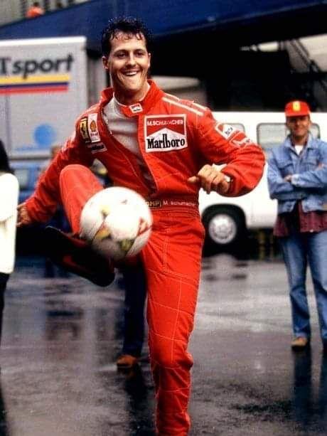 Michael Schumacher playing football.