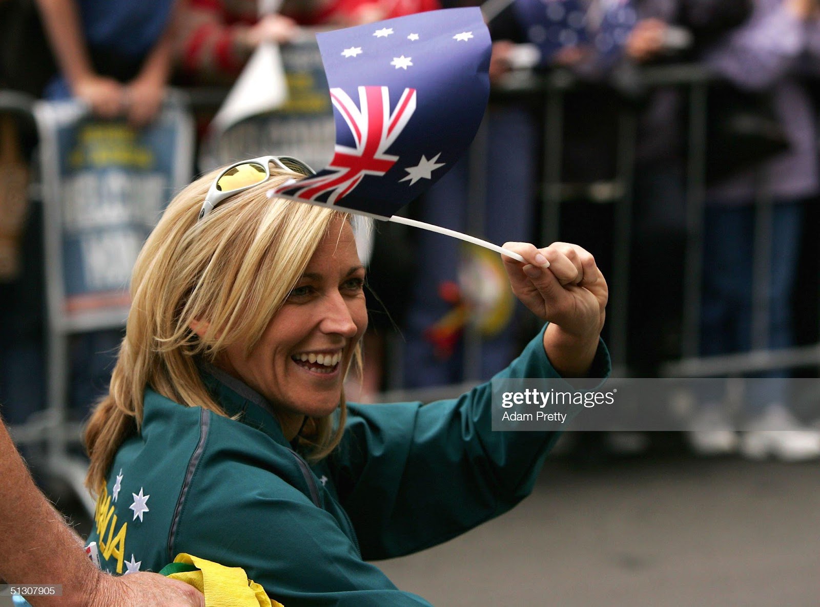 Beach Volleyball player Kerry Pottharst enjoys the National Welcome Home Parade for the Australian Olympic Team as they walk down George Street September 15, 2004 in Sydney, Australia.