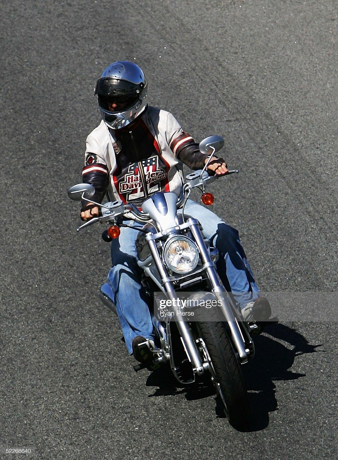 Michael Schumacher rides his Harley Davidson motorcycle prior to the Australian F1 Grand Prix on March 3, 2005 in Melbourne.