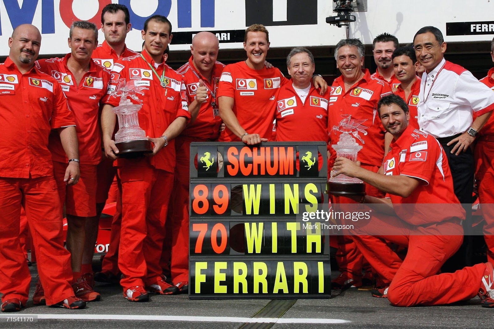 Michael Schumacher, Ferrari, celebrates his victory with his team-mates after the German F1 Grand Prix at the Hockenheimring on July 30, 2006 in Hockenheim, Germany.