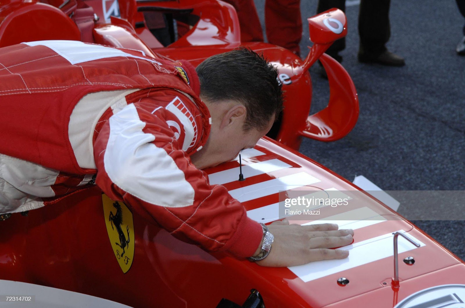 Michael Schumacher kisses his Ferrari during the Ferrari Days on October 29, 2006 in Monza, Italy.