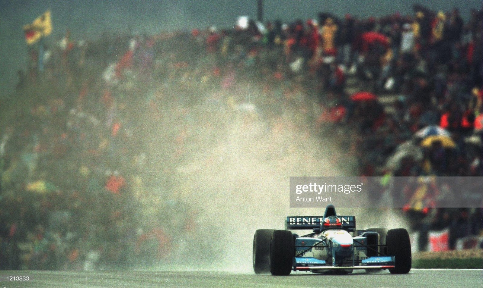 30 September 1995: Michael Schumacher in the Benetton sends up a wall of spray in front of his home crowd on the second day of practice at the European Grand Prix at the Nurburgring in Germany.