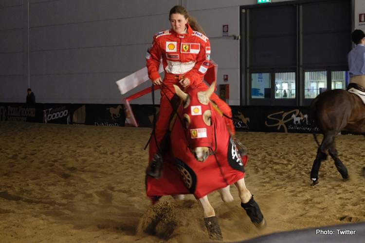 Gina Maria Schumacher riding a horse wearing a Ferrari tracksuit.