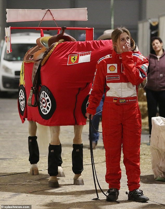 Gina Maria Schumacher and her Ferrari dressed horse.