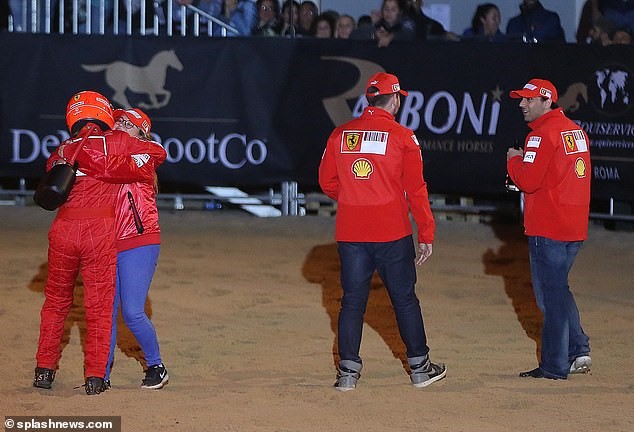 The 22-year-old horse rider was seen embracing others who had donned Ferrari jackets for her routine.