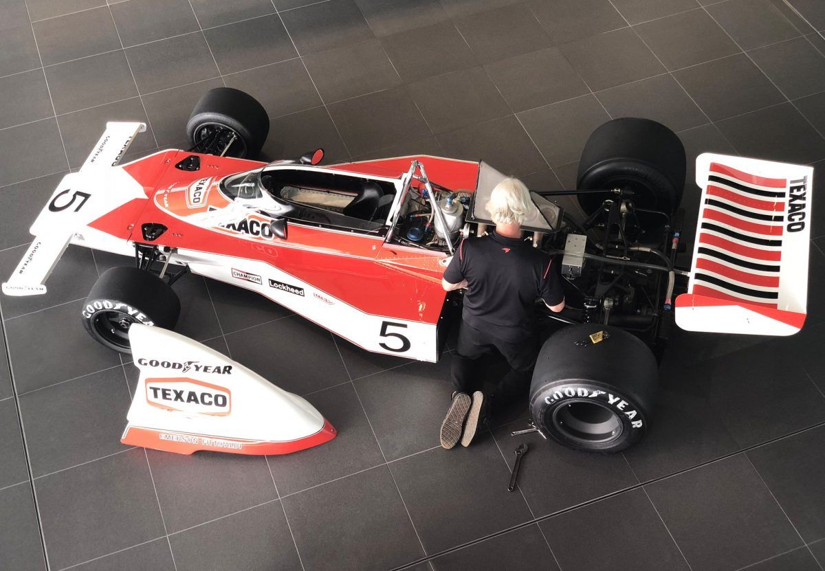 Neil Trundle working on a McLaren. 