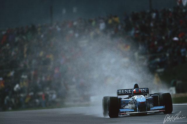 Michael Schumacher, Benetton, winning at Nurburgring.