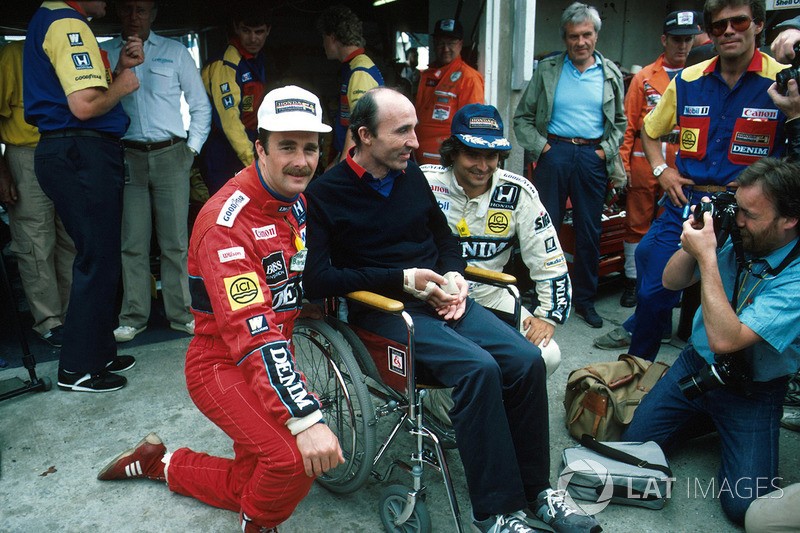 F1 British GP 1986, winner Nigel Mansell with team boss Frank Williams and team mate Nelson Piquet.