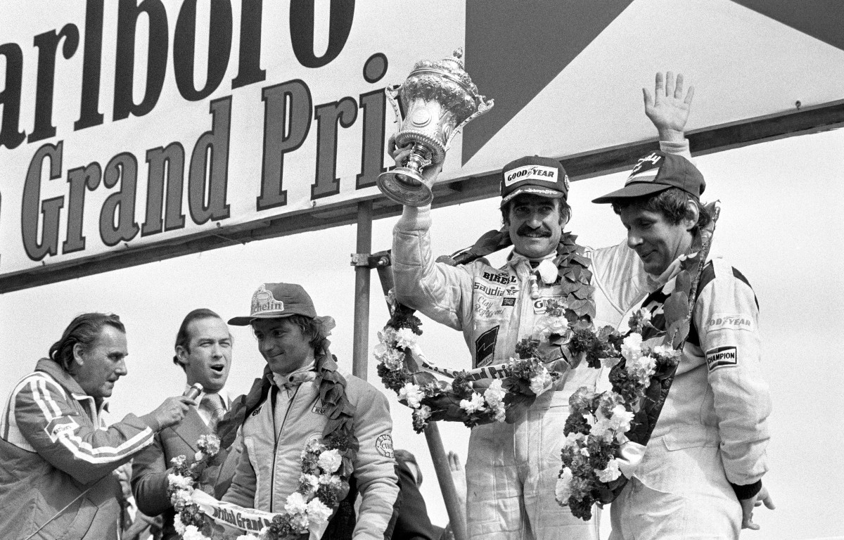 Rene' Arnoux and Clay Regazzoni on the podium.
