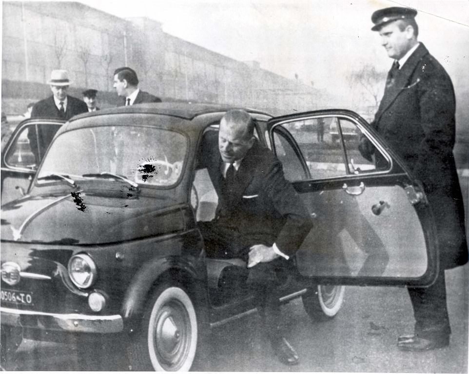 4 December 1962: the Duke of Edinburgh, appears to be having a little trouble getting into a Fiat 500cc baby car before testing the tiny vehicle on the factory’s track during his visit to the Fiat plant in Turin. The Duke was paying a private visit to Italy as a guest of the Italian Marquis Medici Del Vascello on the latter’s estate near Turin.