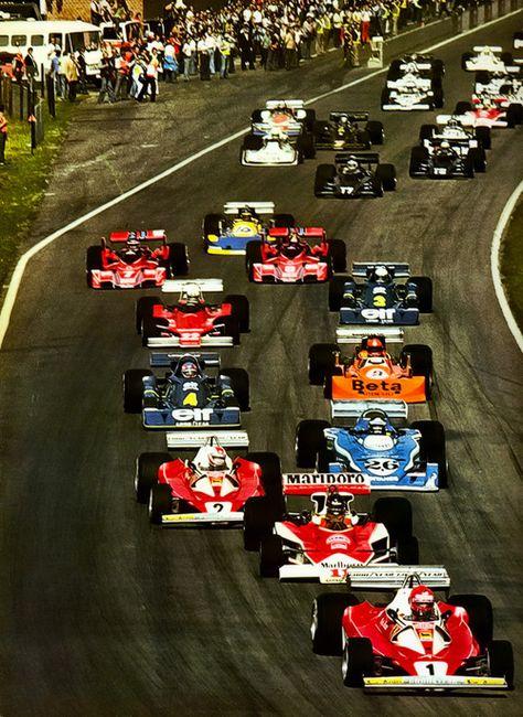 1976 Belgian Grand Prix, Zolder. The pack is led by Niki Lauda in the n.1 Ferrari 312 T2. In the n.11 McLaren M23 was James Hunt followed by Clay Regazzoni in the n.2.
